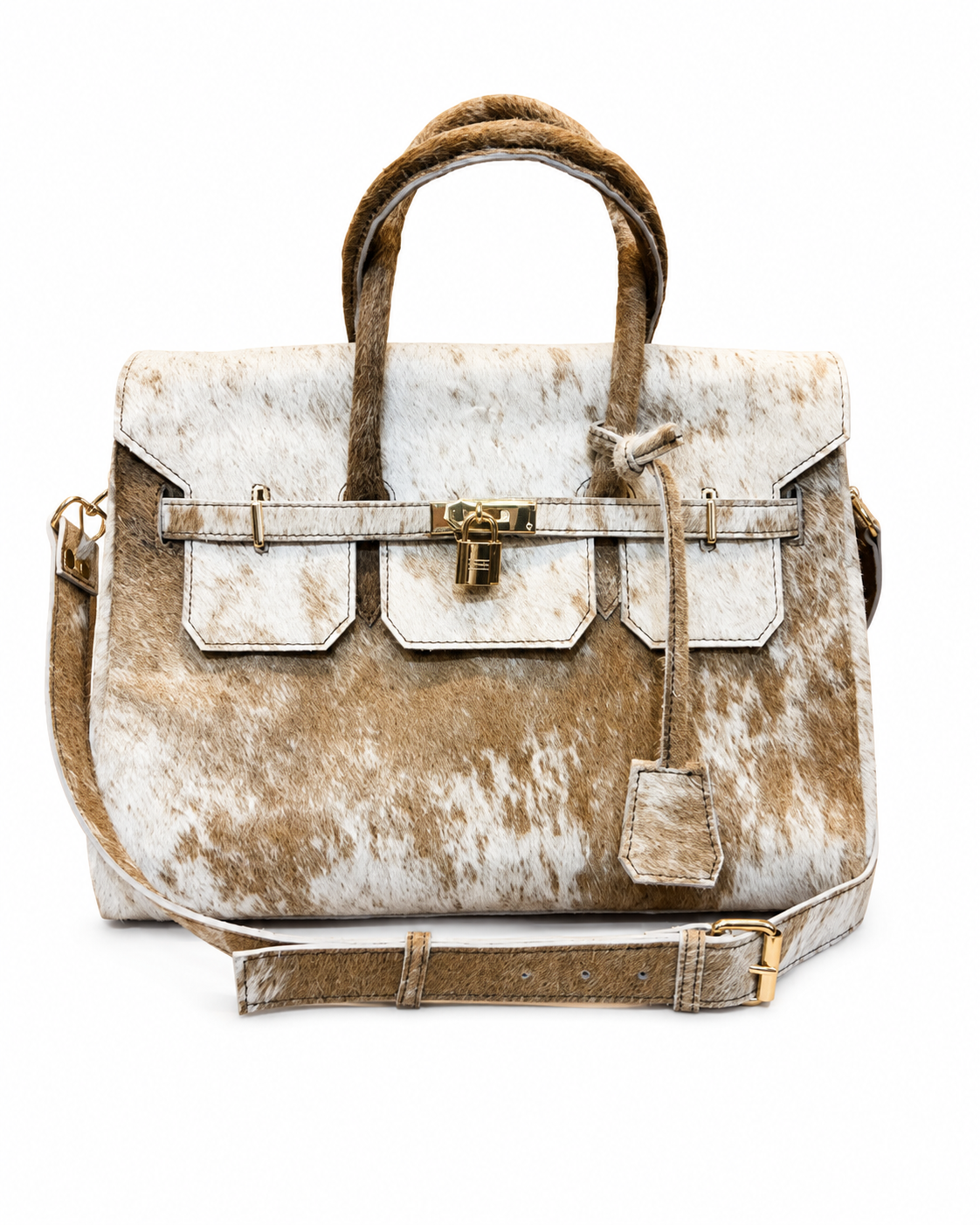 A structured handbag with a cowhide-inspired pattern in brown and white, featuring dual top handles, a front flap with decorative pockets and a padlock detail, and a detachable shoulder strap, shown on a plain white background.