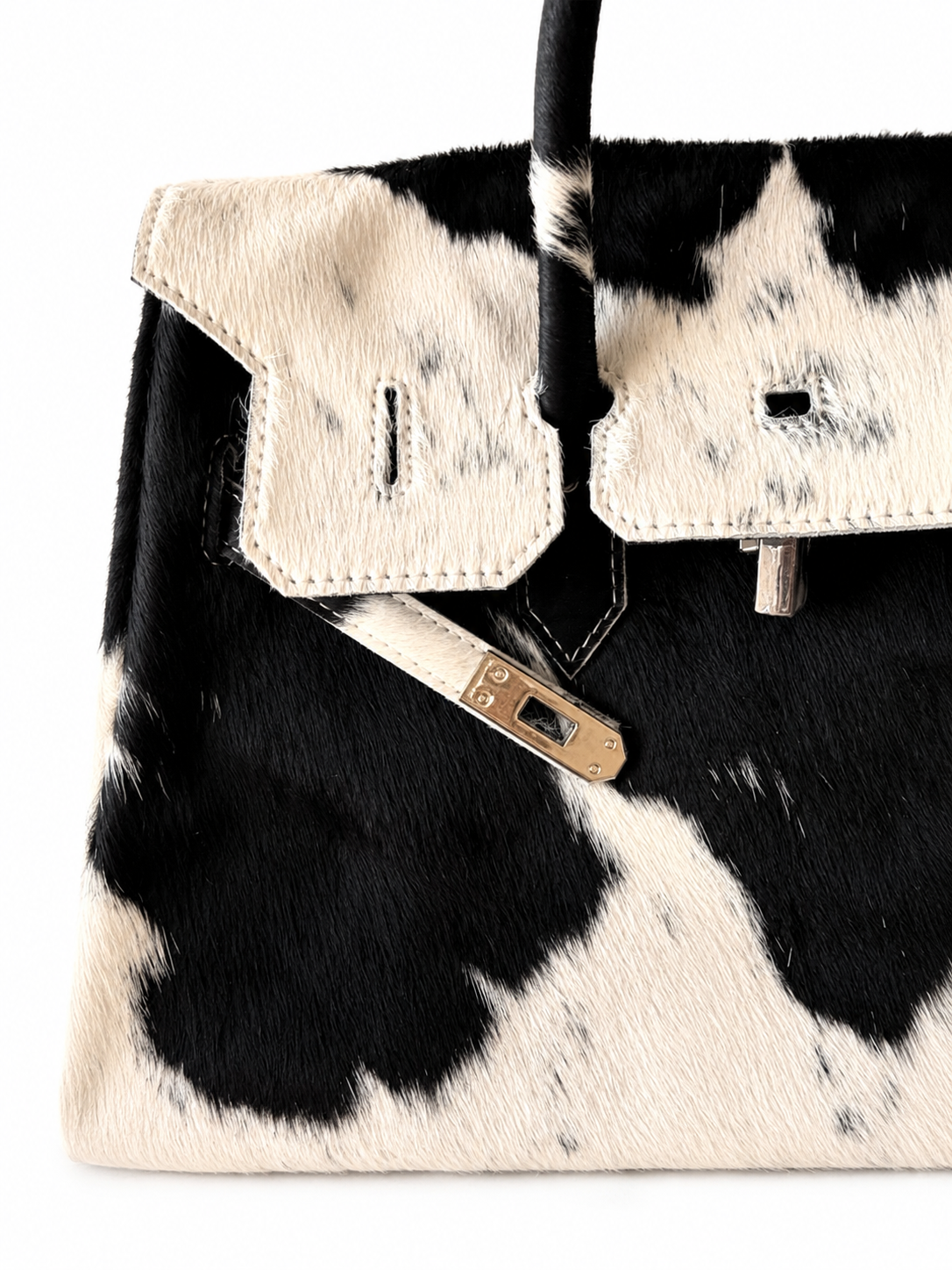 The Seraphine large black and ivory natural cowhide handbag by Hide & Heir