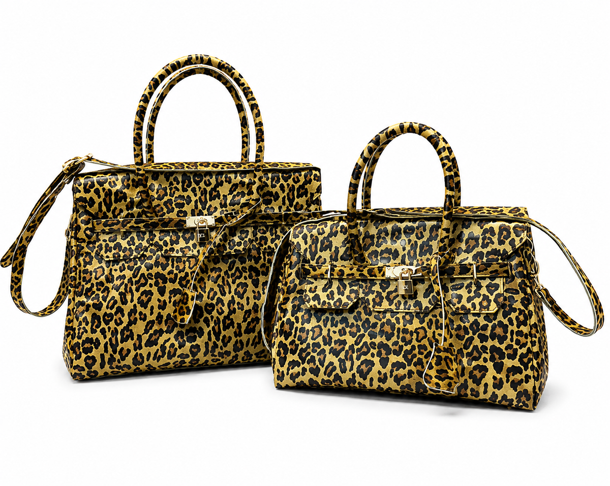 Two leopard-print handbags in different sizes displayed on a clean white background. The bags feature a bold yellow, black, and brown animal pattern with gold-tone metal hardware and dual top handles.