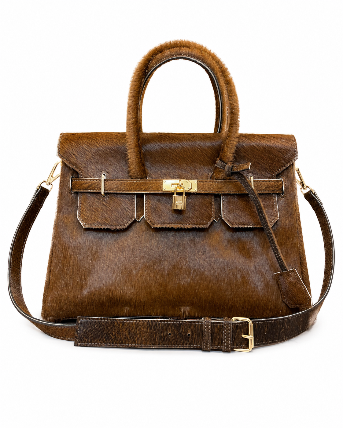 A brown hair-on-hide handbag with a textured finish, featuring a top handle, a front flap with a padlock detail, and a matching shoulder strap, shown on a plain white background.