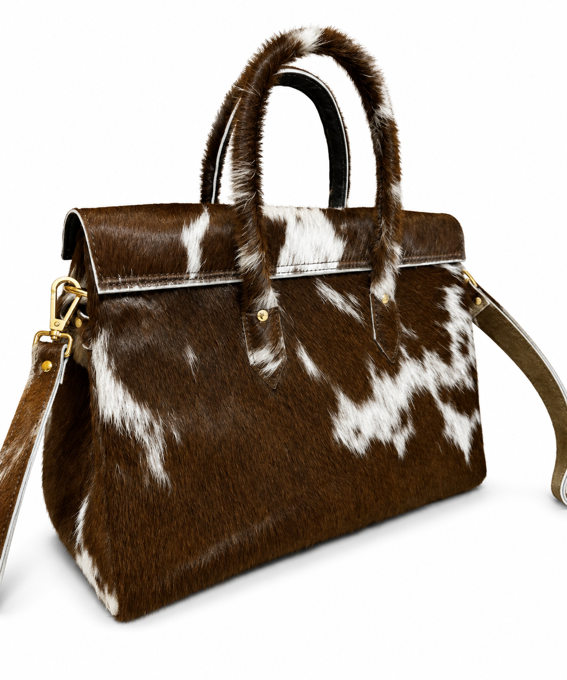 A structured handbag with a brown and white cowhide pattern, featuring dual top handles and a shoulder strap, shown on a plain white background.